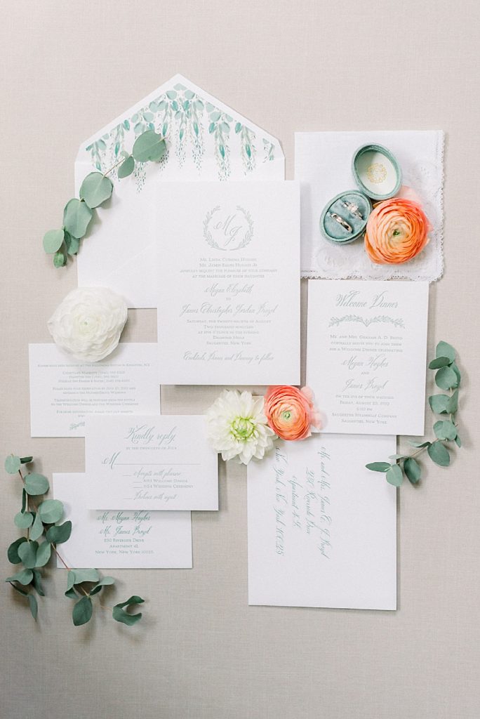 invitation suite with coral and cream florals