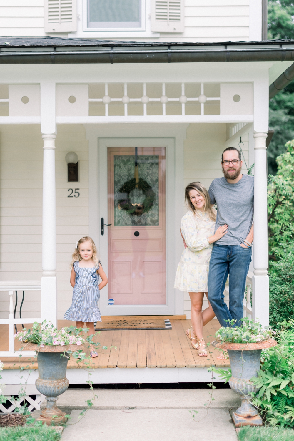 cute family with pink front door