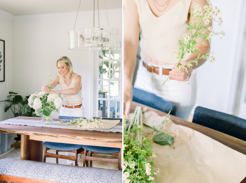 Woman flower arranging in home.